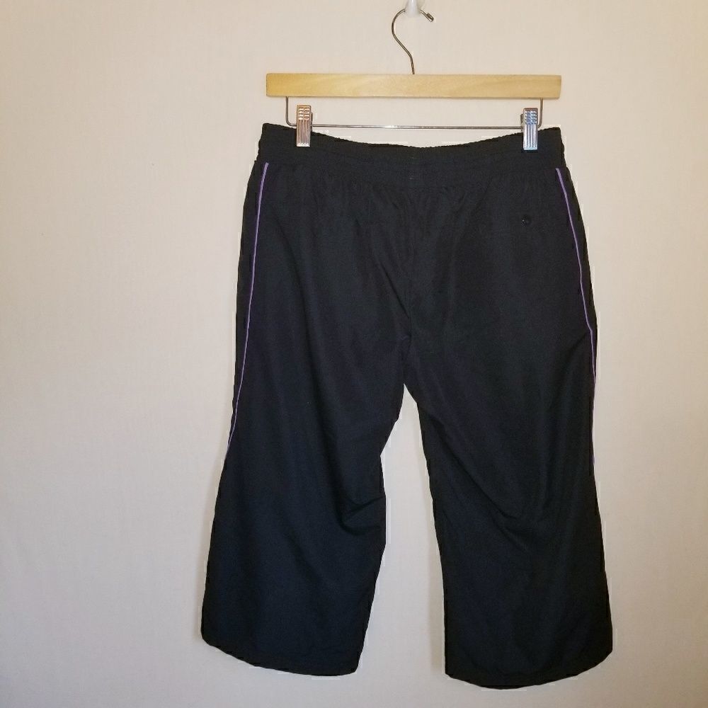 Nike workout shorts medium purple and black.